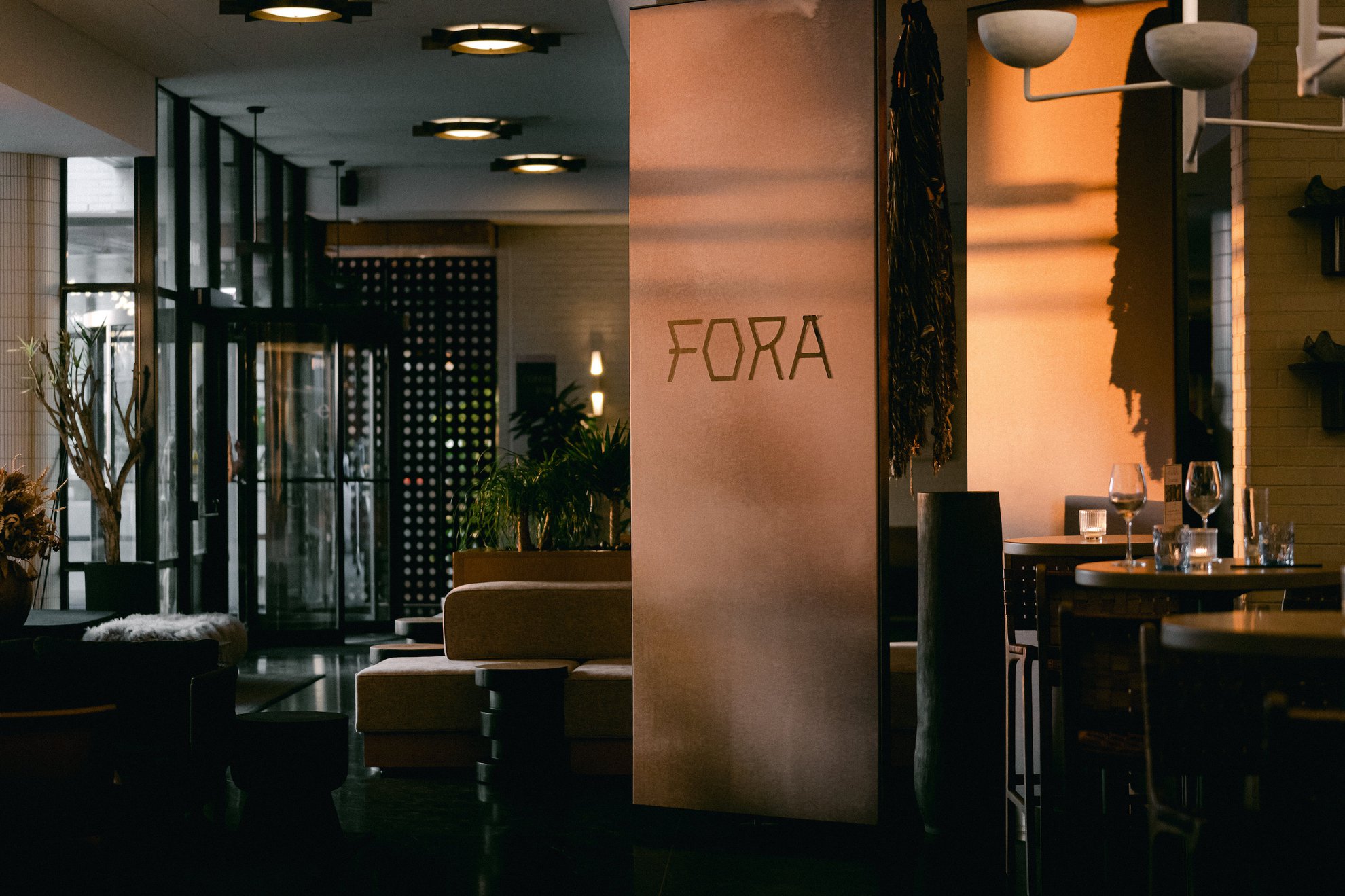 fora restaurant inviting atmosphere boats wooden furniture, table sets at the emily hotel fulton market west loop chciago